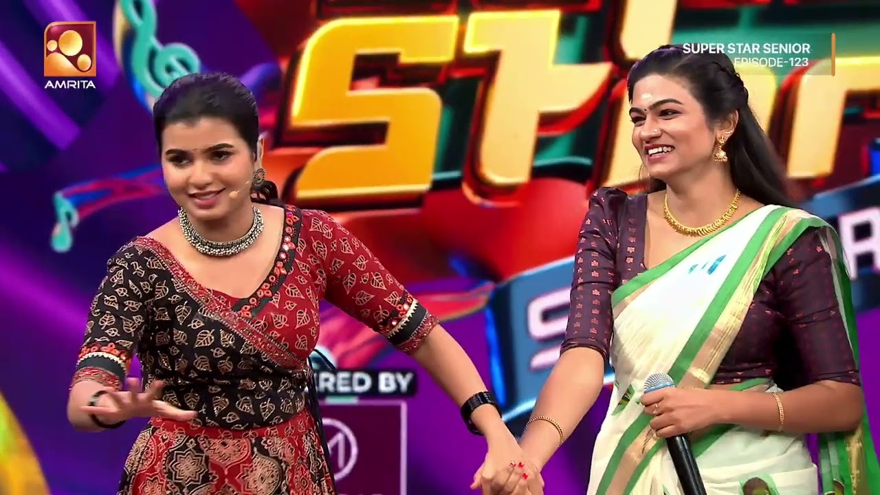 പാട്ടിന്റെ വേദിയിൽ പ്രിയ ഗായകനെ കാണുവാൻ ഒരു ആരാധിക |