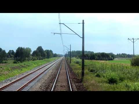 Traveling by train, view to the rails through back window