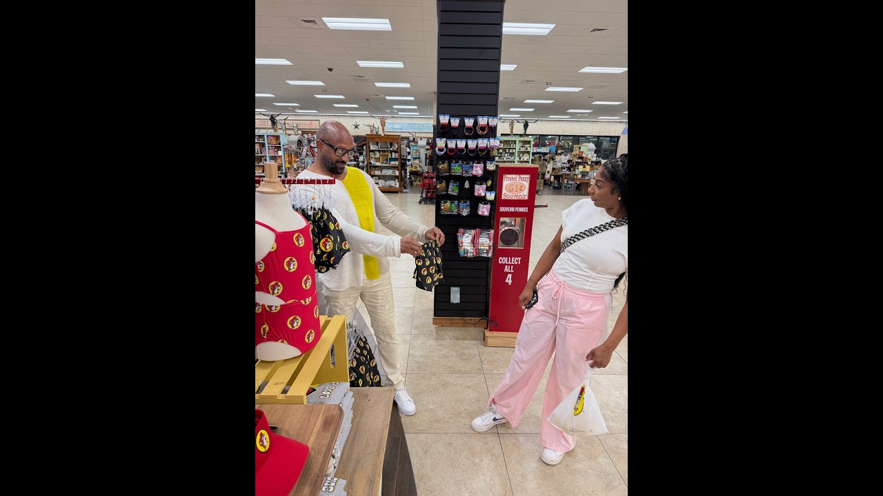Larry tries to buy Sharra some small shorts what they make a pit stop