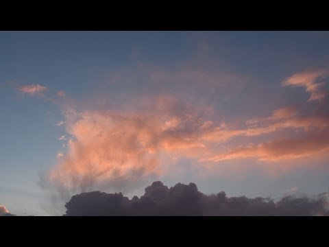 Storm Clouds Give Way to Sunset Colors Time-Lapse in 4k UHD