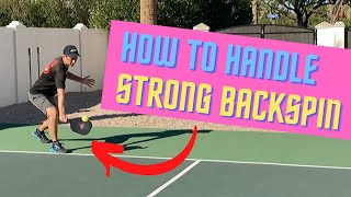 What to do when your opponent hits a strong BACKSPIN return in pickleball