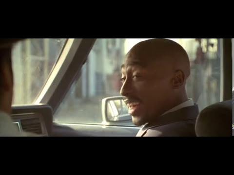 Trailer image of patrol lights over LA streets, matching the album’s g-funk tension