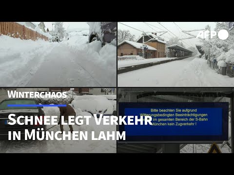 Heftiger Schneefall legt Bahn- und Flugverkehr in München lahm | AFP