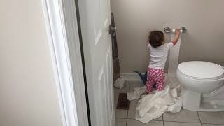 Jude emptying the toilet paper roll