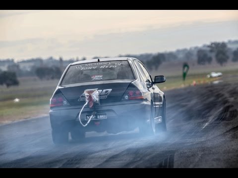 Two 9-Second Evo Monsters with sequential box on a Runway