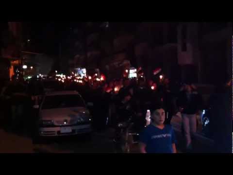 غياث مطر في مسيرة شموع مسائية في مدينة داريا في ريف دمشق