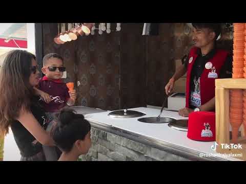 Nepal Kathmandu twisting scoops icecream,,,Karen dhami