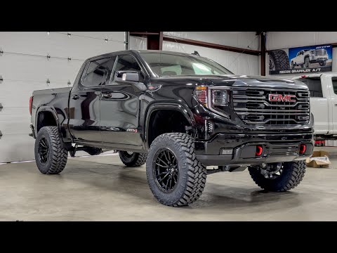 2023 GMC AT4 with 4” Zone lift on 20x10s/35” trails