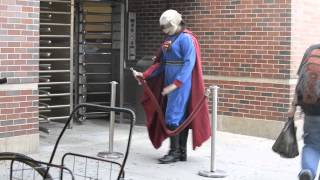 Superman In Sock Monkey Head, Greets Brooklyn Commuters