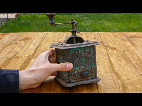 The old 19th century coffee grinder has been beautifully restored.