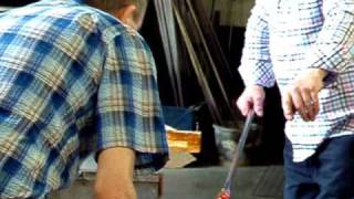 preview picture of video 'Glassmaking -- Cane Pulling - Peter Holmes at Broadfield House Museum - June 2010.'