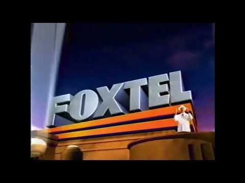 Foxtel promo with umpire on searchlight logo