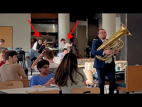 Guy with tuba in cafeteria surprises everyone with the most exquisite sound