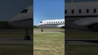 Beautiful Sunset Aviation Bombardier Global Express taxi on runway Alpha after arrival