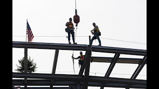 Grand Rapids amphitheater halfway built as workers host canopy ‘topping-off ceremony’