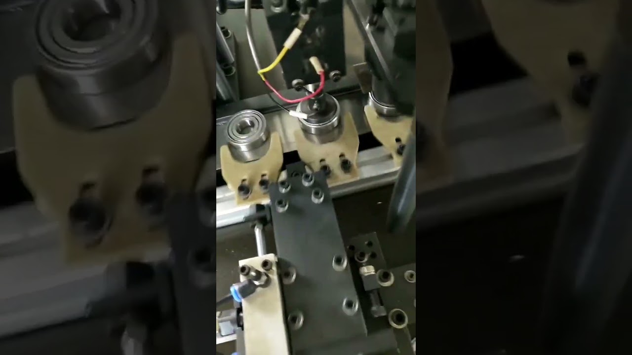 Automatic bearing assembly machine