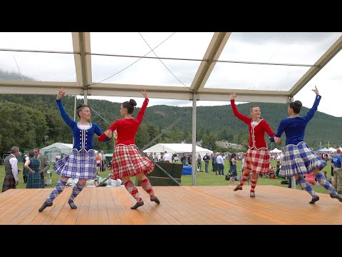 Scottish Champion Highland dancers compete in Reel of Tulloch during 2023 Ballater Highland Games