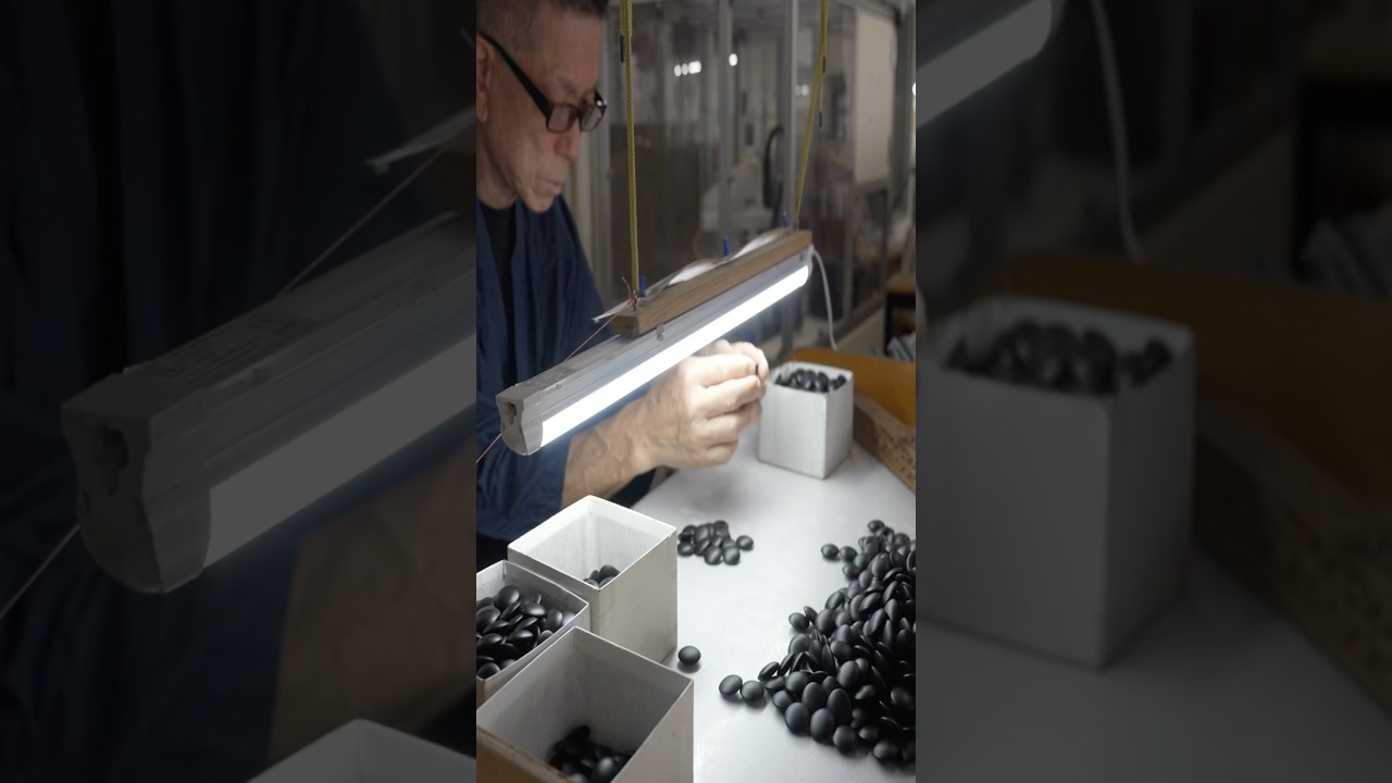 Process of making Go stones: Premium Japanese stones hand-carved from shell and stone.