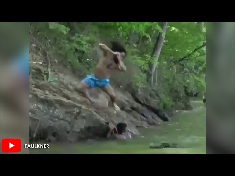 Guy Drops Wrestling Move Off River's Edge To Save Friend From Alligator