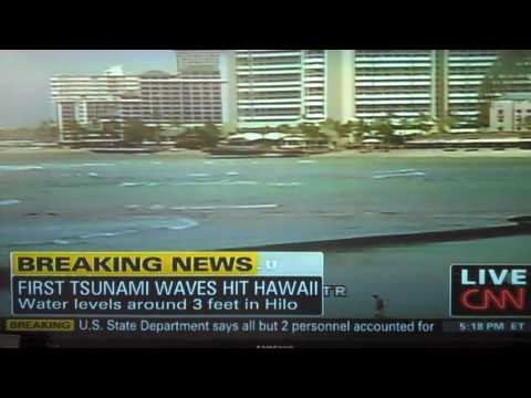 Idiot on the beach during the Tsunami in Hawaii