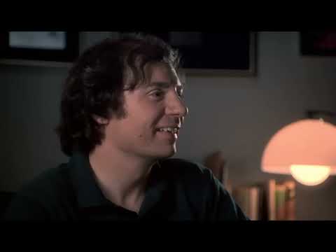 Director’s Cut trailer frame: mirror ball shards over the crowd at Studio 54