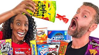 Brits Try AMERICAN SNACKS for the FIRST TIME!