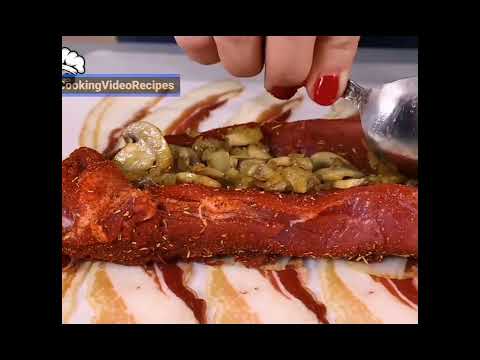 Pork tenderloin on a bacon roll stuffed with mushrooms