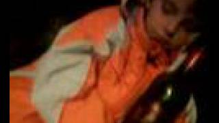 Nasty little boy smoking and drinking alcohol