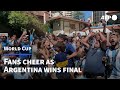 Fans in Buenos Aires cheer as Argentina beat France on penalties | AFP
