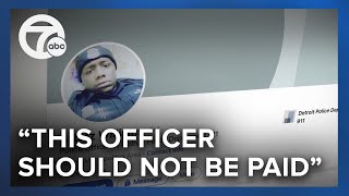 Why was this officer getting paid while sitting in jail