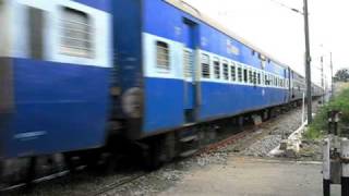 preview picture of video 'rail fanning at wangapalli rail crossing where an express thunders past'