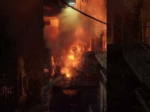 Watch as an electric arc furnace is loaded with scrap #factory #steel #parati #amazing #viral