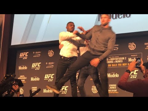 JON JONES PUSHES GUSTAFSSON AT UFC 232 PRESS CONFERENCE