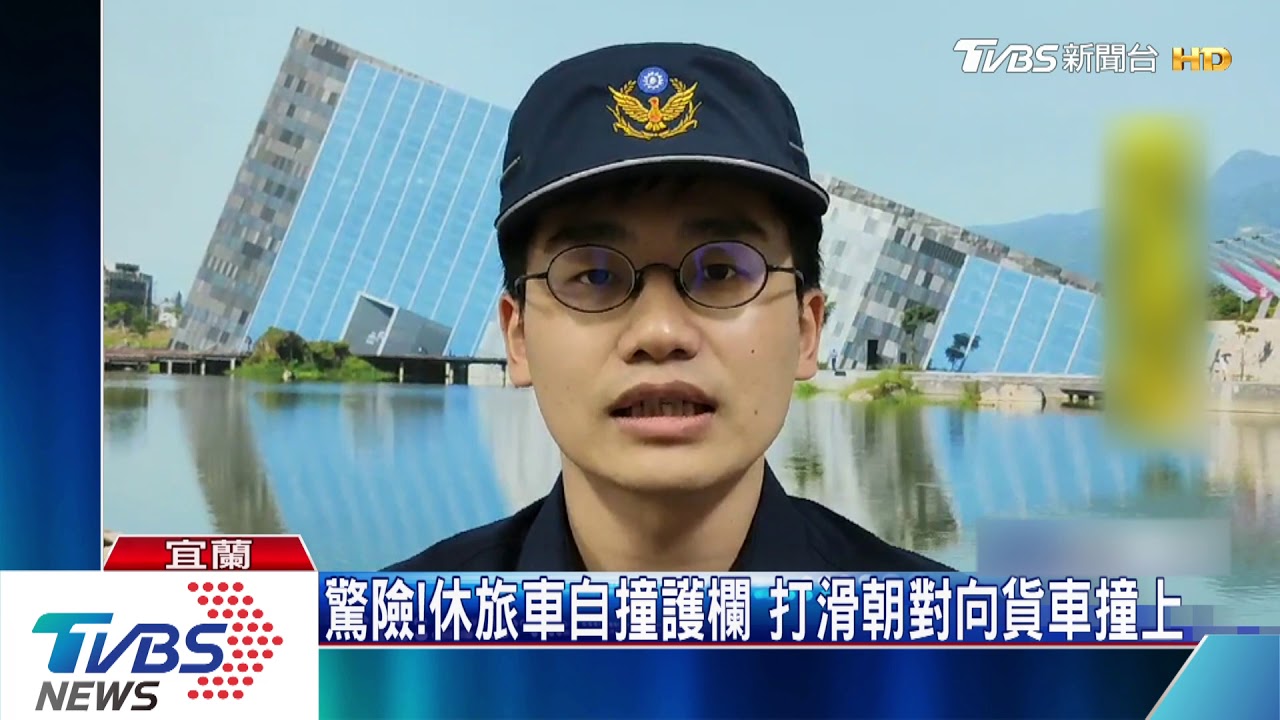 驚險!休旅車自撞護欄 打滑朝對向貨車撞上