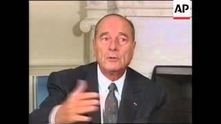 French President arrives at his hotel and meets President Bush