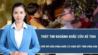 Tin tức nóng: Thót tim khoảnh khắc cứu bé trai chới với giữa dòng nước lũ cuộn xiết trên sông Hàn