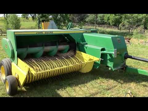 BigIron Lot # HI7171 John Deere 348 Small Square Baler, online auction ends August 2, 2023