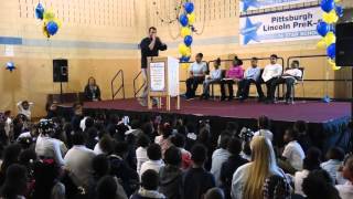 URL Battle rapper Real Deal raps to students for achievement