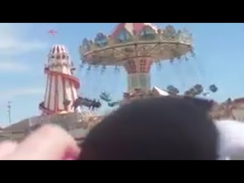 Boat past the fun fair