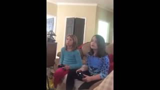 Ava and Luna playing xbox