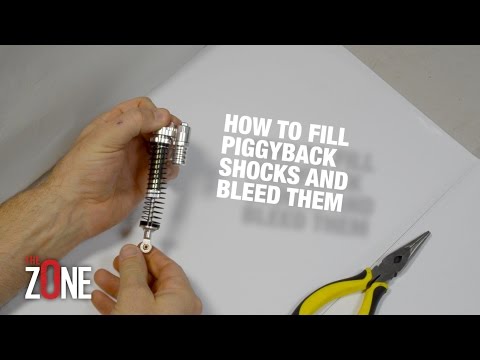 HOW TO PUT OIL INTO YOUR RC's Piggyback Shocks - The O-Zone