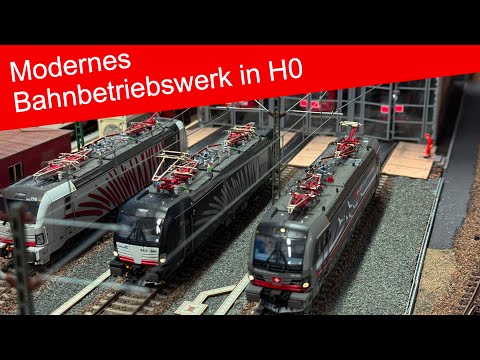 A modern railway depot in H0 scale is being built