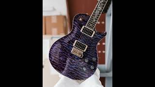 A unique Tree of Life inlay on an aqua-violet McCarty 594 Singlecut