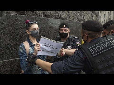 Russian official charged with spying says allegations relate to work as journalist