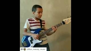 Clifton: 9 y/o bass-player slapping like a master!