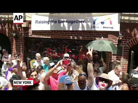 Five decades of LGBTQ pride was celebrated Sunday as crowds gathered outside New York's historic Stonewall Inn to mark the 50th anniversary of the police raid that sparked the modern-day gay rights movement and thousands marched through the city. (June 30)