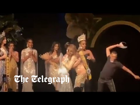 Man smashes beauty pageant winner's crown after his wife comes second