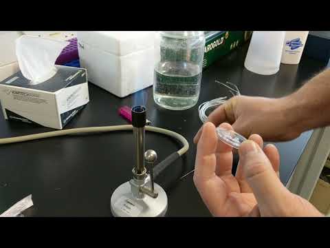 Creating thread-holes for fluidic tubing using a bunsen burner