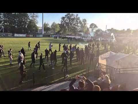 Fans of Gryf Słupsk and Elana Toruń ran onto the pitch halfway through the match