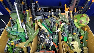 Three Boxes of Military Force Toy Weapons and Equi